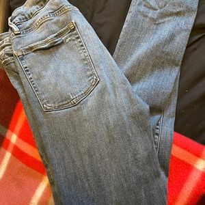 Good American distresses Good Waist Jeans